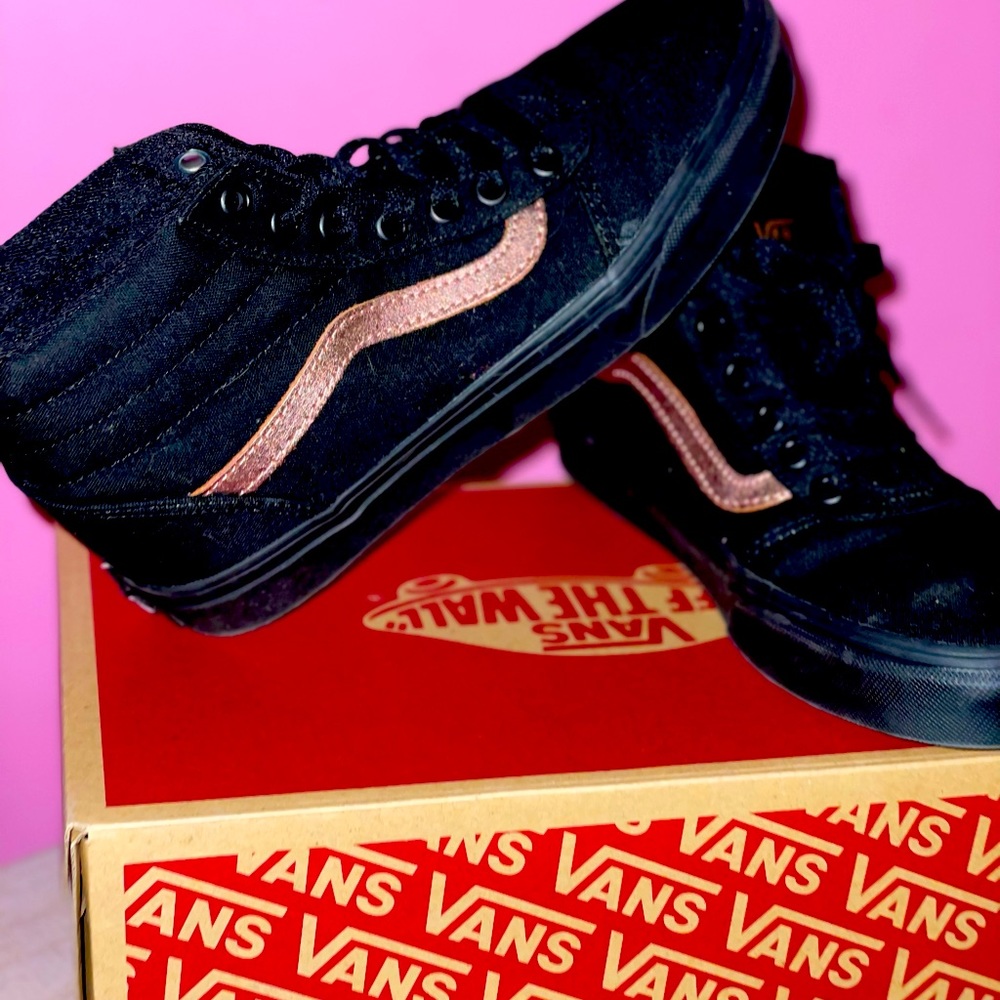Size 7 black high top Vans sneakers
